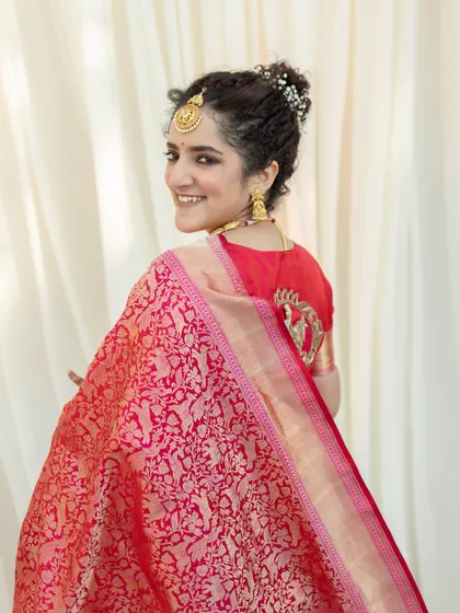 A duplicate of a joyful bridal portrait, capturing her radiant smile. This shot is full of happiness and is a perfect representation of a bride on her special day.