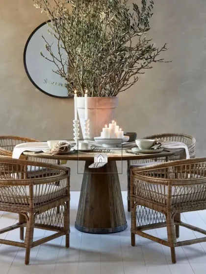 This elegant rattan dining set is designed for intimate gatherings in both indoor and covered outdoor settings. The armchairs provide comfortable seating, while the natural texture of the weave adds a warm, organic feel to any dining space.