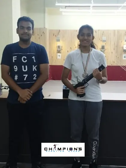 Sharvi Shrivastav with her coach after winning a silver medal in the CBSE District School Championship. We nurture talent from a young age.