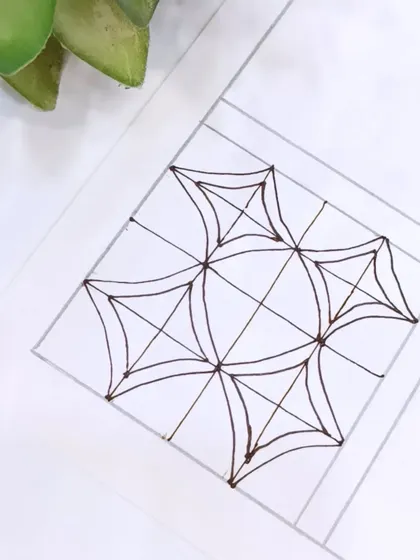 The basic line structure for the geometric grid. I teach my students to use light guide lines for perfect symmetry.