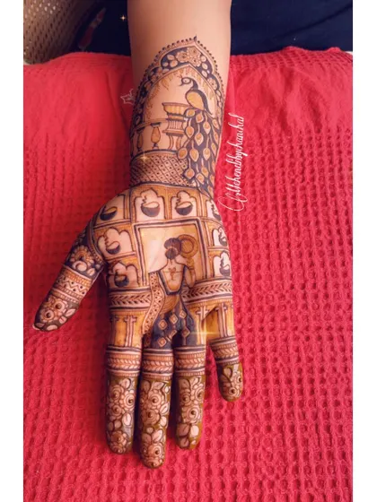 A single hand from a Karwa Chauth set, showing a woman in traditional attire with diyas, celebrating the festival of lights and love.