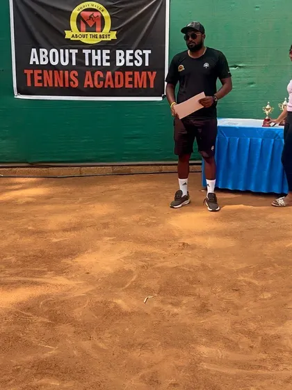 A candid shot of our head coach during the closing ceremony of our tournament.