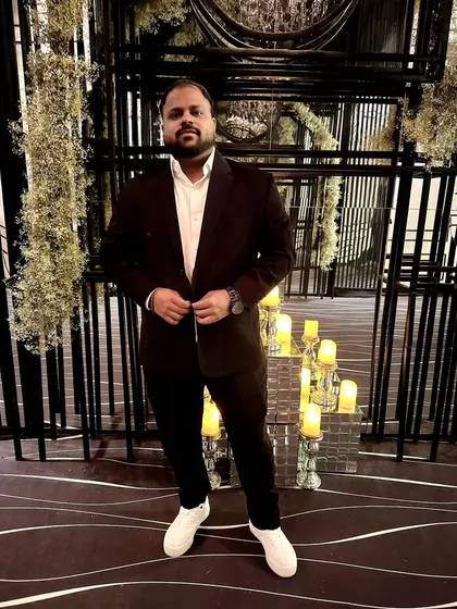 Another look from a wedding event, showing how I blend in with the formal atmosphere while being ready to turn up the energy when the time is right.
