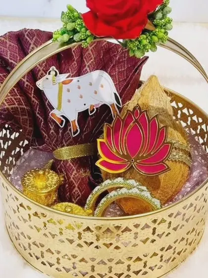 Another view of the popular gold basket, showing how the items are carefully arranged to create a full and luxurious appearance for your guests.