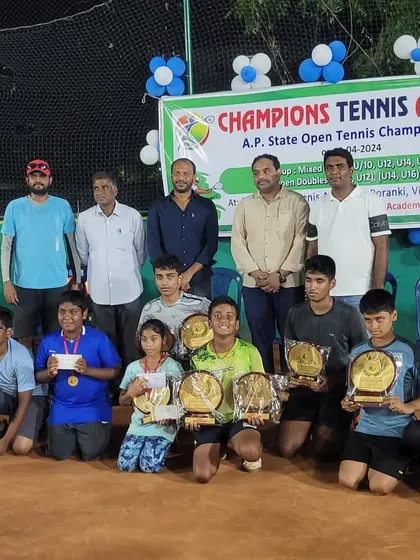 A group photo celebrating Keerthana's victory at the U16 state championship. Team success and individual achievements go hand in hand at our academy.