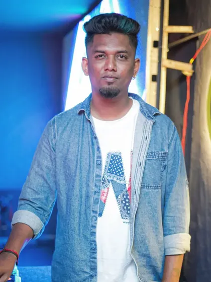 A professional shot of me ready for a gig. I take my work seriously and always come prepared to deliver a great performance.
