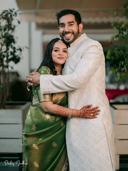 A warm and happy hug between Ojasi and Rutvik at their engagement party in Pune.