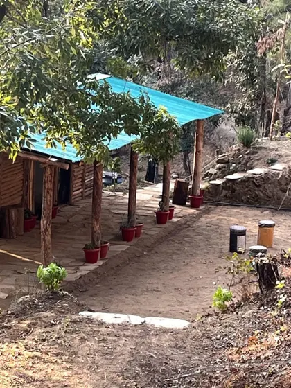 The exterior of our campsite, built by Rakesh Rana at his native place in Mukteshwar. The location is surrounded by beautiful trails and hiking paths, making it an ideal spot for outdoor enthusiasts.