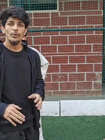 A shot of me coaching during a leg strength video shoot. I believe in giving clear, practical instructions that you can use to improve your own workouts.