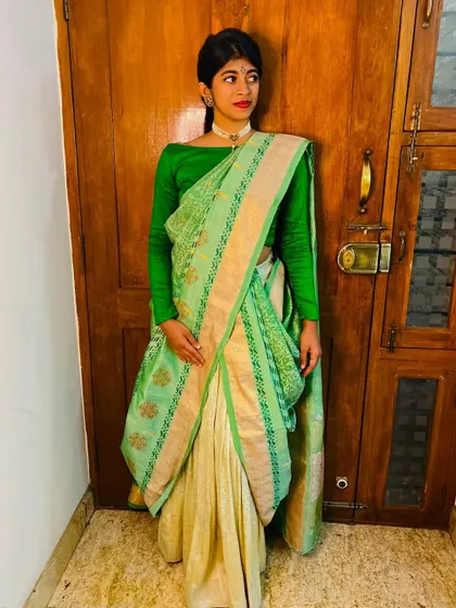 Another angle of our block-printed Kanjeevaram, showing how the new pattern flows with the original drape of the saree.