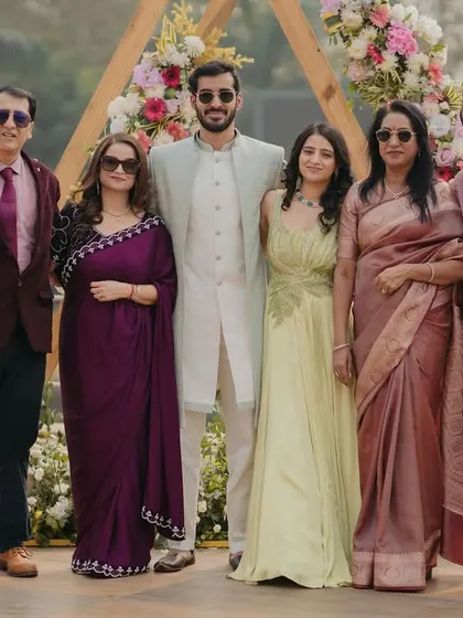 A beautiful family portrait from the roka ceremony. Everyone looks stylish and happy, celebrating the couple's union.