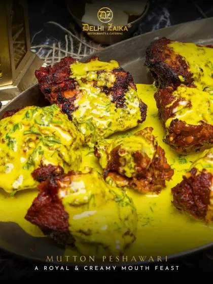 My Mutton Peshawari is a royal and creamy mouth feast. Tender pieces of mutton are cooked in the tandoor and then bathed in a luxurious, mildly spiced yellow cream sauce. It’s a dish that speaks of the grandeur of the North-West Frontier.