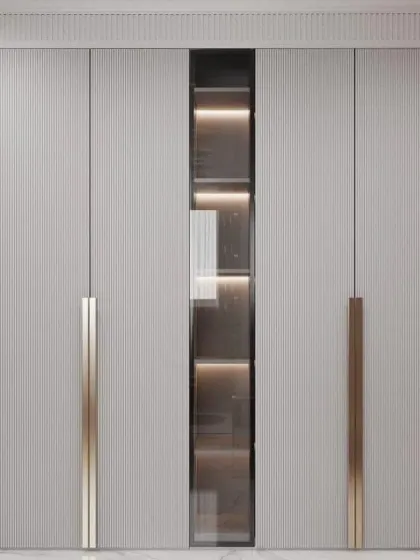 A highly modern wardrobe design with ribbed door panels and a central smoked glass section with internal lighting. This feature is perfect for displaying select items like bags or accessories.