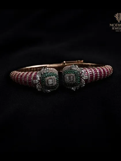 A unique and colorful bangle with ruby and emerald elements. This piece showcases my ability to blend traditional gemstones in a bold, contemporary design.