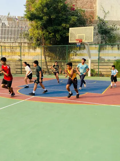 Players run a fast break, a key part of our up-tempo style.