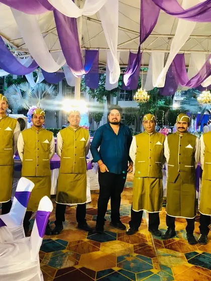 Our founder with the service team at a private celebration. We take pride in our hands-on approach and the dedication of our staff, who are the backbone of our success.