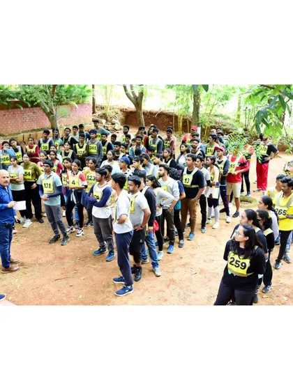 A large group of participants listening to instructions from army officers at the Value Lanes adventure camp.