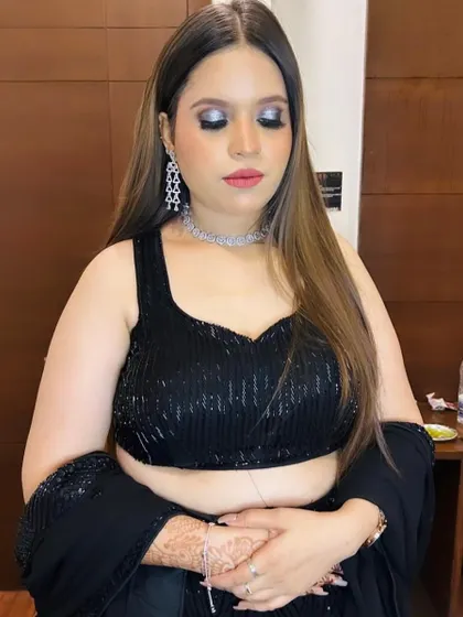A shot with eyes closed to showcase the detailed blending of the metallic eyeshadow.