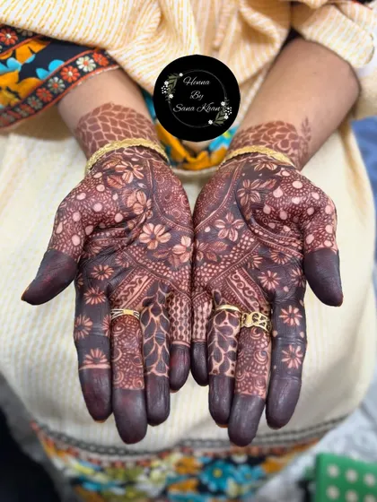 A full view of the beautiful dark stain. The intricate details of the floral and jaali patterns are even more striking with this deep color.