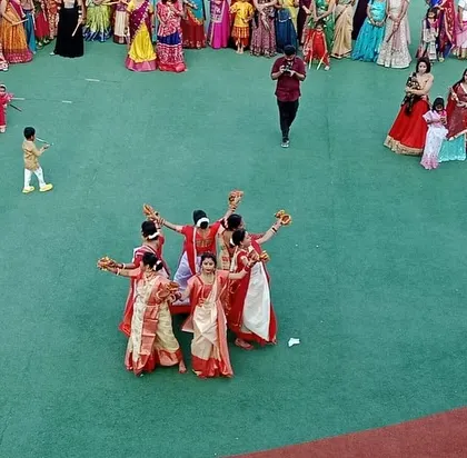 Another angle of the graceful performance by the mothers' group during our Dandiya celebration.
