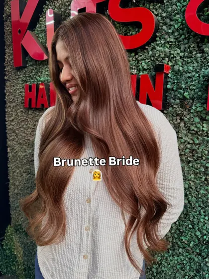 We love a brunette bride. This rich, warm brown color is the perfect look for her wedding festivities.