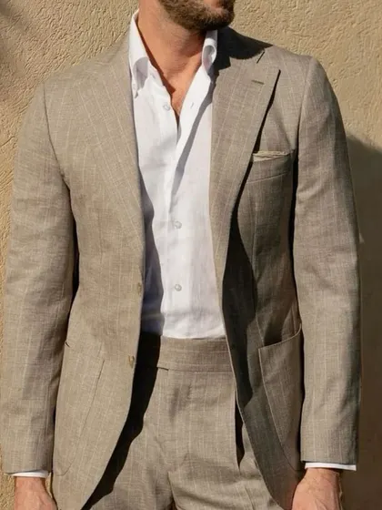 Experience effortless elegance with our custom linen suits. Perfect for warmer weather, this suit combines a relaxed feel with a sharp, tailored structure. We bring a curated selection of premium linens to your home, helping you design the ideal summer wardrobe.