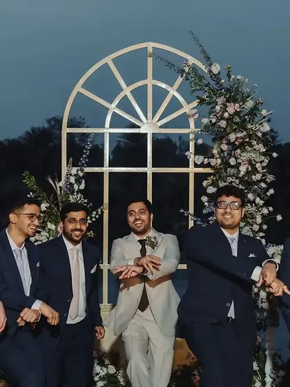 The complete wedding squad! We love capturing these fun, energetic photos of the bride, groom, and their closest friends, celebrating the moment together.