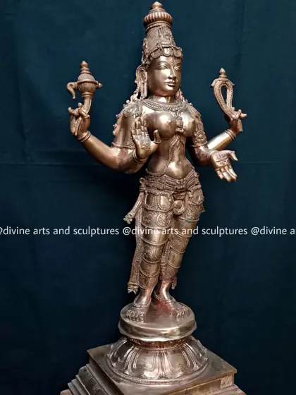 A 28-inch Panchaloha sculpture of Bhuvaneswari, the queen of the universe. This magnificent piece, with its fine details and commanding presence, was commissioned for a client in Sydney, Australia.