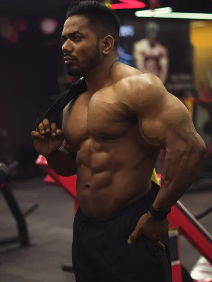 A side profile, showing chest and shoulder development.