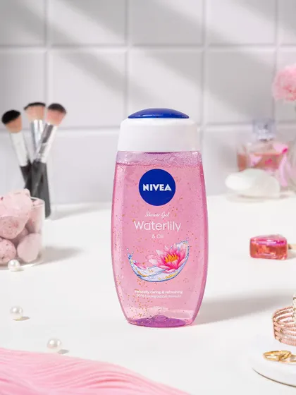 For Nivea's Waterlily shower gel, I created a soft, feminine bathroom vanity scene. The pink tones, pearls, and makeup brushes help position the product as part of a luxurious self-care routine.