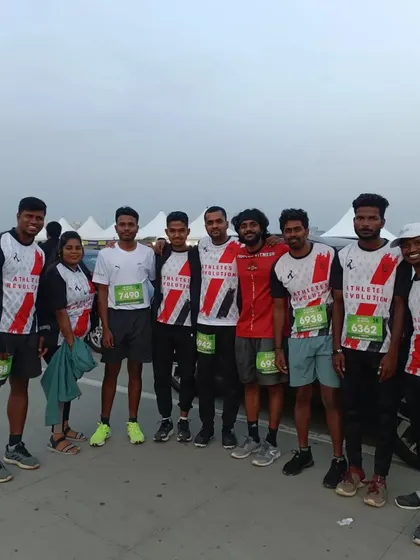 The whole team together at the One8 Run. We are a community of runners dedicated to becoming better versions of ourselves every day.