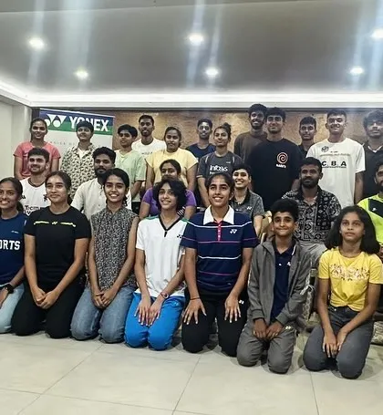 A group photo of players, including our own Lal Sai Samith, being honored by the Karnataka Badminton Association for their performances in national-level championships.