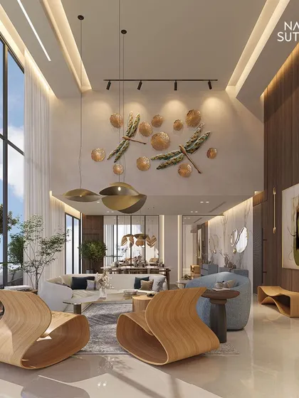 Sculptural wooden chairs and dragonfly wall art introduce organic forms into the linear, modern space. This juxtaposition of art and architecture is key to creating homes with personality and soul.