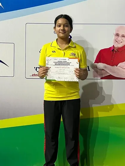 Aanya Bisht proudly displaying her certificate after winning a bronze medal at the Yonex-Sunrise All India Sub-Junior Ranking Tournament in Vijayawada.