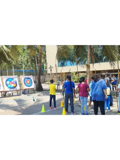 The final day of camp is always a blast with fun activities. Here, students are getting ready for a balloon-popping competition.