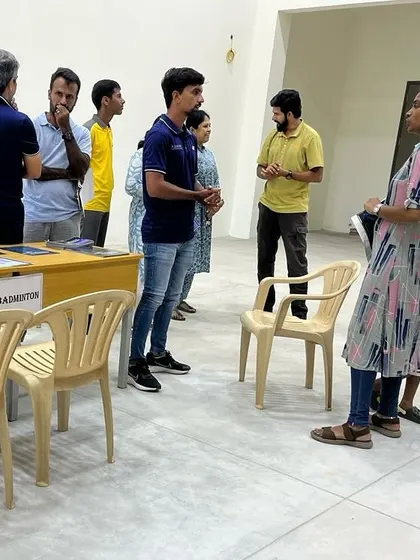 Parents and prospective students inquiring about our curated badminton programs at the newly launched center in Pollachi.