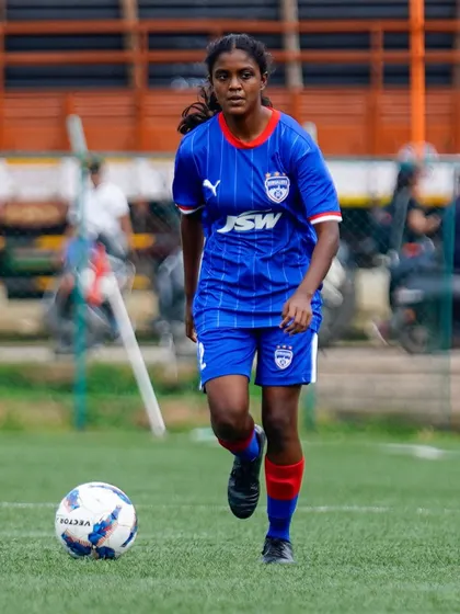 Janani Thoppur on the ball during a KWL match. Her composure and skill are a testament to the strong foundation she built at our soccer schools.