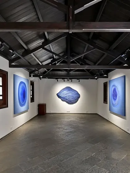 The Batley Gallery, a former kitchen block, was readapted into a modern exhibition space. We exposed the original wooden roof trusses and combined them with contemporary track lighting to create a space that honors its history while serving a new function.