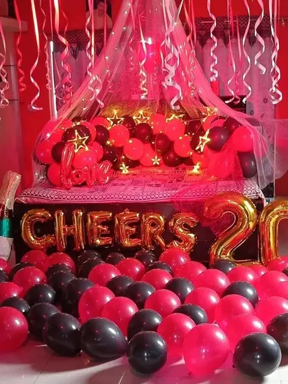 A complete look at the red and black themed room decoration, perfect for making a bold statement for any special celebration.