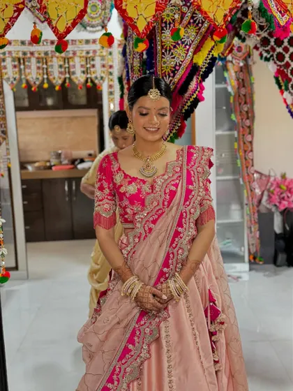 A candid moment of the bride's bhabhi during the wedding festivities.