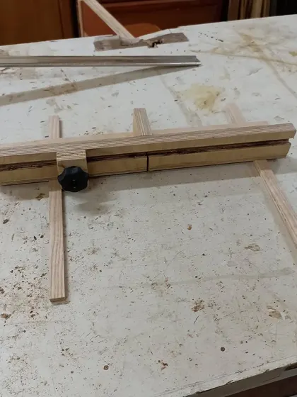 A mini crosscut sled I made for my table saw. This jig allows for safe and accurate cross-grain cuts, especially on small pieces.