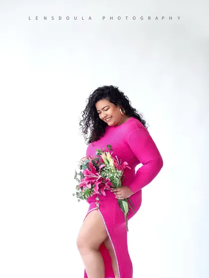 Adding a bouquet of flowers can bring a touch of nature and vibrant color to your indoor studio portraits.