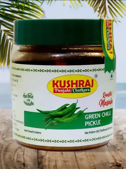 This is my Green Chilli Pickle, a perfect blend of spice and tang. The product shot shows the clean packaging and the promise of a homemade taste.