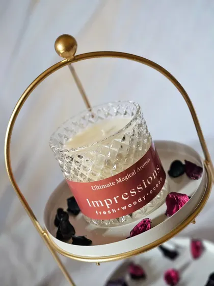 My 'Impressions' Crystal Jar Candle, with its fresh, woody, and ocean notes, is designed to leave a lasting impact, just like a cherished memory.