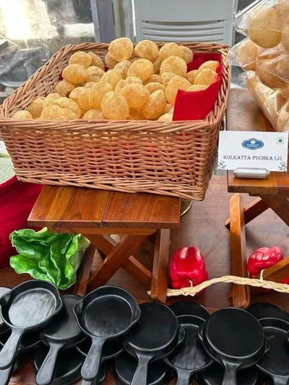 Our 'Kolkatta Puchka Lo' station, a crowd favorite for Indian street food lovers. We set up everything needed for guests to enjoy fresh pani puri, including the puris, spicy water, and various fillings.