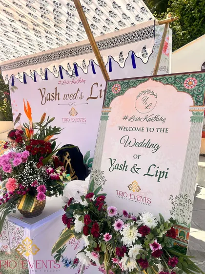 A personalized welcome sign and information desk, ensuring guests have all the information they need while feeling like a cherished part of the celebration.