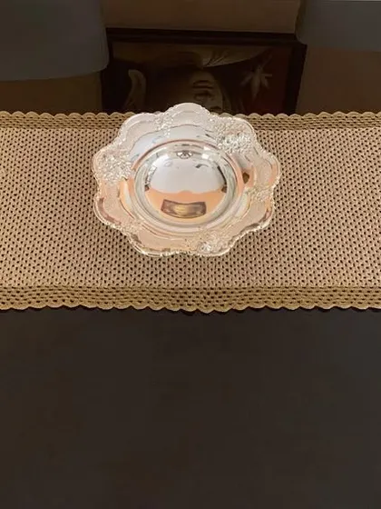 Another view of the classic gold runner, a timeless piece for any home.