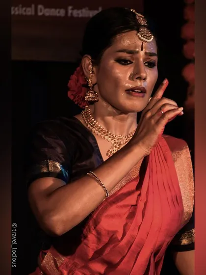 A close up capturing the intense emotion and focus of the performer.