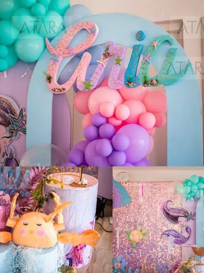A collage of our mermaid party decor, showcasing the name 'Aria' in a mermaid-tail font, a crab-shaped plush toy, and a shimmering backdrop, all contributing to the underwater fantasy.