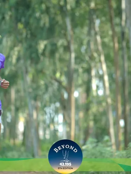 Running with focus through a wooded section of the course. Training on varied terrain prepares you for any race condition.